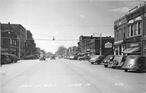 J69/ Osage Iowa RPPC Postcard c40-50s Main Street Stores 206