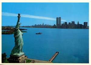 NY - New York City. Statue of Liberty and Lower Manhattan Skyline