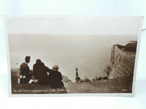 Family Enjoying a Picnic at Beachy Head Lighthouse Eastbourne RP Postcard 1939