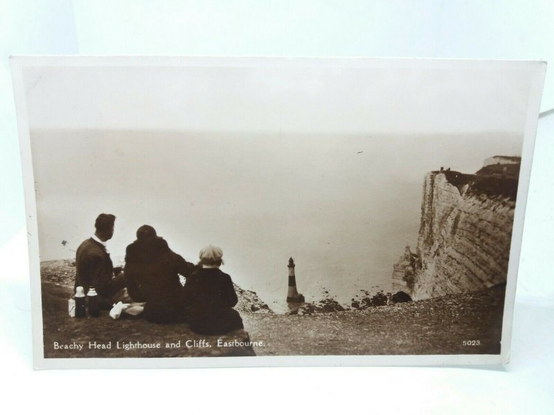 Family Enjoying a Picnic at Beachy Head Lighthouse Eastbourne RP Postcard 1939