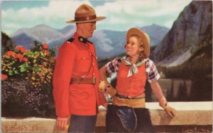 Cowgirl and RCMP Royal Canadian Police Mountie Canada 1950s Postcard H27 *as is