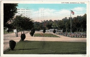 1933 GAINESVILLE Texas Tx Postcard CITY PARK Flag Flowers