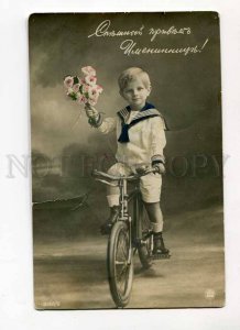 3031544 Russian boy on bicycle Vintage photo PC