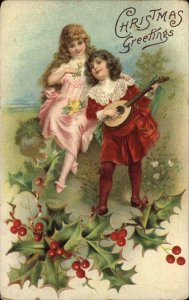Christmas Little Boy Playing Lute Mandolin for Beautiful Girl c1910 Postcard