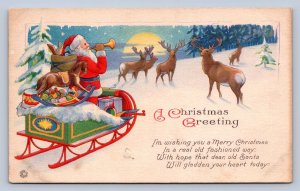 K1/ Santa Claus Christmas Postcard c1910 Reindeer Sleigh Horn 168