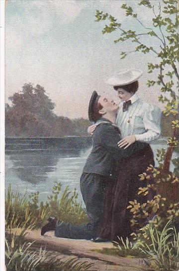 Romantic Couple Embracing Along Lakeside