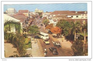 Busy little Bay Street, main street of Nassau in the Bahamas, 40-60s