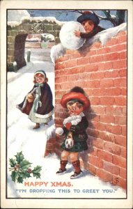 Christmas Children Snowball Fight Boy with Giant Snowball c1910 Vintage Postcard