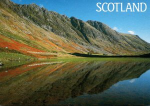 Scotland Glencoe The Aonach Eagach Ridge Reflected In Loch Achtriochtan