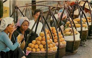 South Vietnam , Saigon, Women Selling Produce in Saigon Market, Mike Roberts