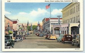 Postcard MI Ironwood Aurora Street East View Old Cars Stores Vintage Linen R27