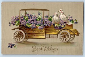 1910 Best Wishes Flowers And Dove Birds On Car Embossed Hamilton OH Postcard