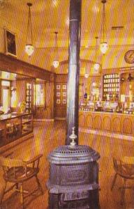 Pot Bellied Stove And Hanging Chandeliers Set The Mood Of Upjohns Old Fashion...