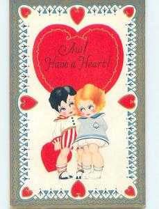 Pre-1907 Valentine GIRL AND BOY STANDING UNDER LARGE PART HL6977