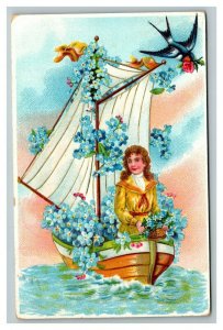 Vintage 1910's Postcard Cute Girl in Sailboat Filled with Blue Flowers Bluebird