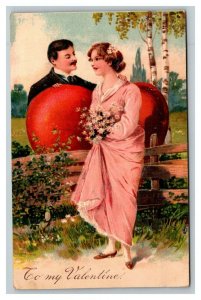 Vintage 1908 Valentines Postcard Man Gives Giant Heart to his Girlfriend