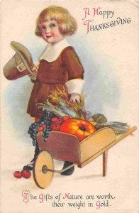 Pilgrim Boy Garden Wheelbarrow Pumpkin Thanksgiving Greetings 1920 postcard