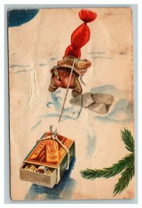 Vintage 1900's Xmas Advertising Postcard Elf Pulling Matches & Cigarette in Snow