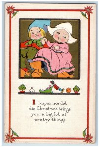 1919 Christmas Dutch Boy Girl Poinsettia Flowers Embossed York PA Postcard 