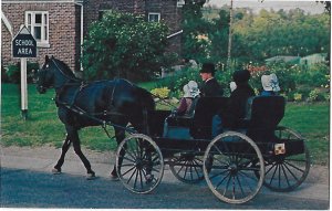 An Old Order Mennonite family Passing Through St Jacobs Ontario Canada