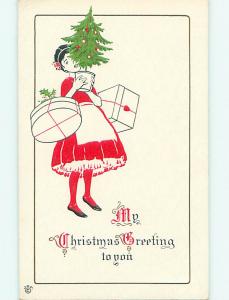 Unused Divided-Back christmas GIRL CARRIES PRESENTS & SMALL XMAS TREE r4457