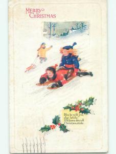 Pre-Linen christmas GIRL ON TOP OF BOY RIDING TOBOGGAN SLED k1195