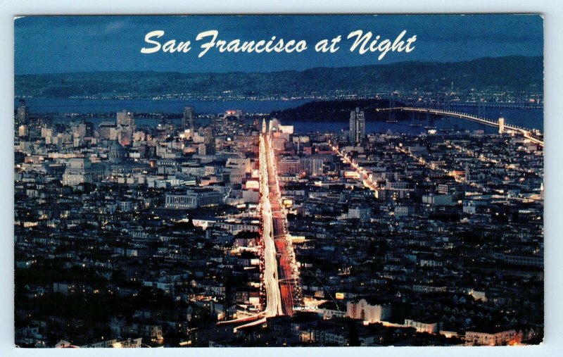 SAN FRANCISCO, CA California ~ View of DOWNTOWN at NIGHT c1950s  Postcard