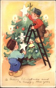 New Year Dutch Little Boys Decorating Christmas Tree Vintage Postcard