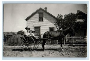 c1910's Mother Daughters Kids Horse Chariot Whip Houses RPPC Photo Postcard 