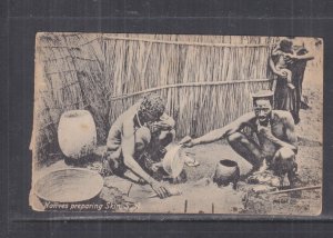SOUTH AFRICA, NATIVES PREPARING SKIN, c1910 ppc., unused.