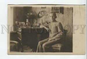 462438 RUSSIA Boy near Writing table INTERIOR Vintage REAL PHOTO postcard