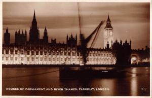 uk16749 houses of parliament and river thames  floodlit london real photo uk