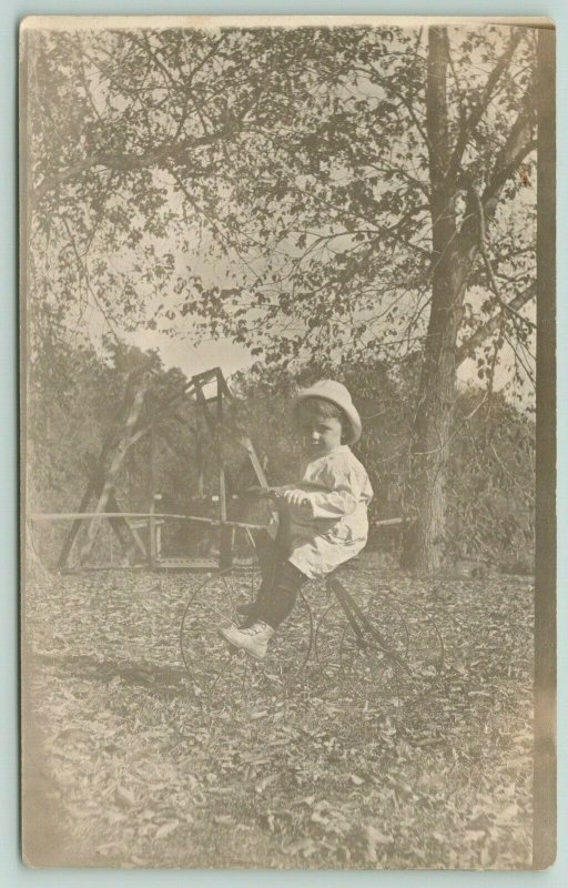 RPPC Little Tyke on Tricycle~Couple Swing~Mid to Late Autumn~Fallen Leaves~c1914 