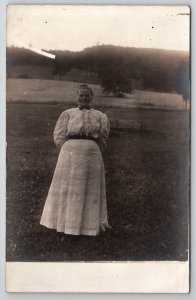 RPPC Woman Posing In Field Calico Dress c1915 Real Photo Postcard Q21