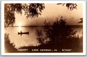 Vtg Iowa IA Sunset on Lake Okoboji Man Rowing Canoe 1920s RPPC DOPS Postcard