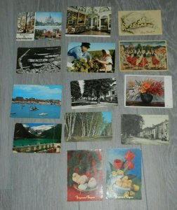 VINTAGE 14 POSTCARDS 1 FROM US AND  THE REST OUTSIDE THE US ALL HAVE WRITING 