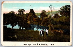 Louisville Ohio 1924 Greetings Postcard Farmer with Cow Lake