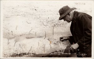 Alaska Man 'An Old Sourdough Gathering Worms' Unused Winter & Pond Postcard E84