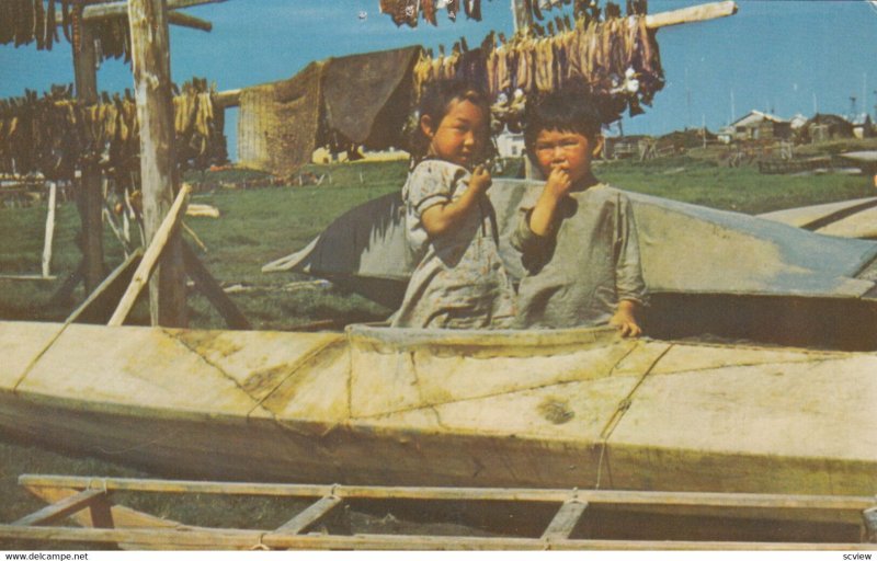 Eskimo children in Sealskin Kayak , Arctic Region , Alaska , 1950-60s