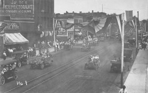 July 4th Parade Scene Decorated Cars Street Scene Real Photo Postcard AA75461