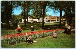 M-29964 The Dutch Children playing in Centennial Park Holland Michigan