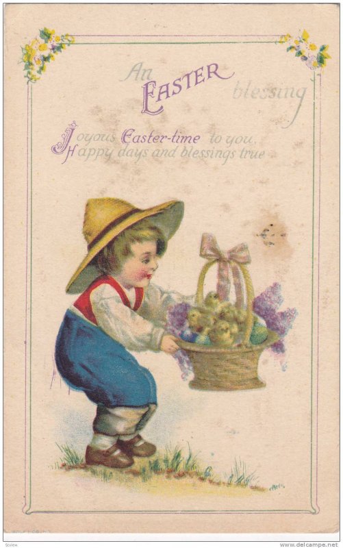 An Easter blessing, Boy in straw hat holding basketful of colored eggs and ch...