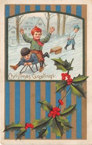 Lot349 christmas children with sledge mistletoe greetings