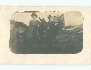 rppc Pre-1918 WOMAN SITTING ON DONKEY MULE AC7543