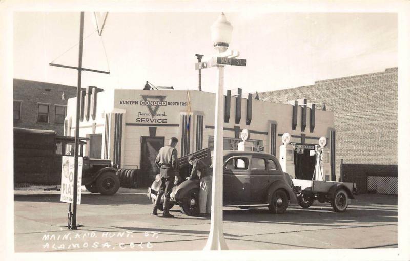 Alamosa CO Main & Hunt Street Conoco Gas Station Auto with Trailer RPPC Postcard