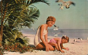 Vintage Postcard Playing in the Sand Mother & Child Beach Bathing Vacation Palms