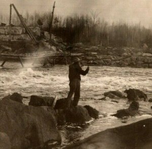 Vintage 1910's RPPC Postcard - Man on Rocks at Riverside Shooting Gun - Hunting