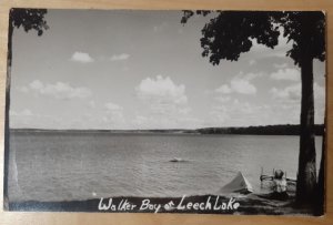 RPPC MN Walker Bay on Leech Lake - woman sitting by tree and boat