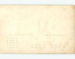 Pre-1918 rppc CHILD ON ANTIQUE CHAIR EMBOSSED BY STUDIO Sioux City IA t2373
