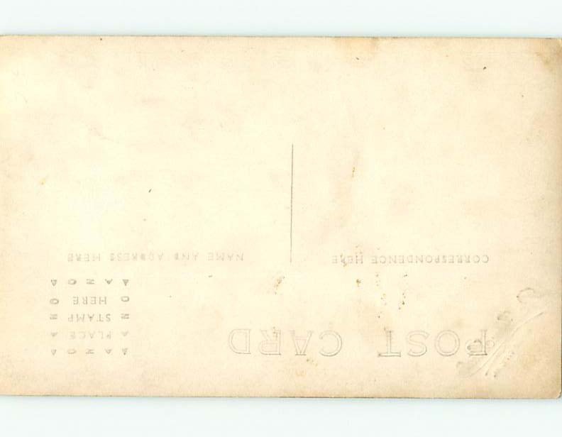 Pre-1918 rppc CHILD ON ANTIQUE CHAIR EMBOSSED BY STUDIO Sioux City IA t2373